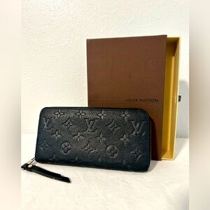 Louis Vuitton zippy black wallet